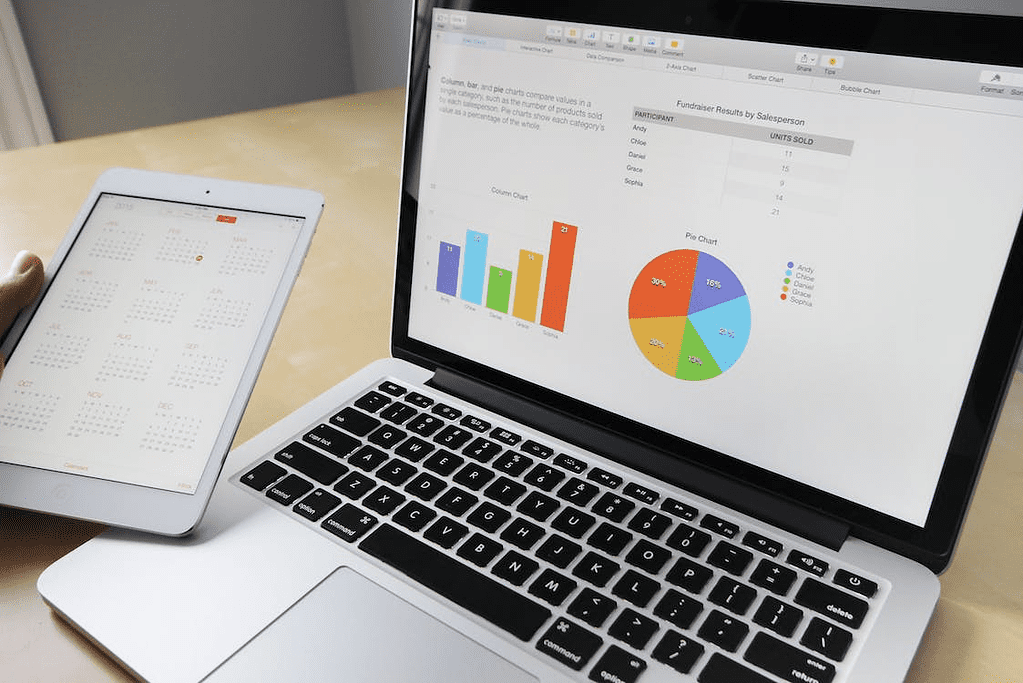 person reading email marketing engagement statistics on a laptop