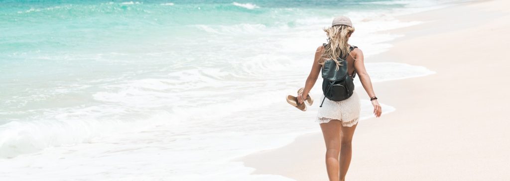 woman on beach happy life